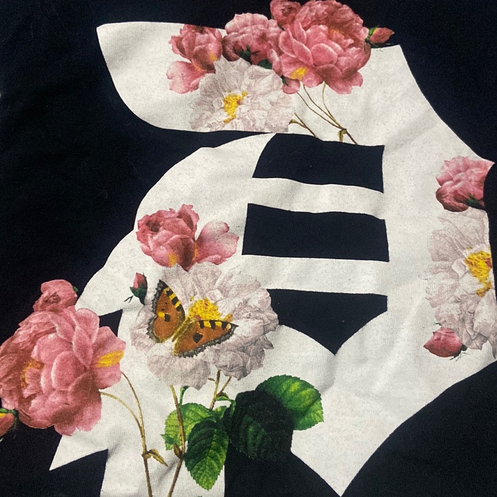 Black primitive tee